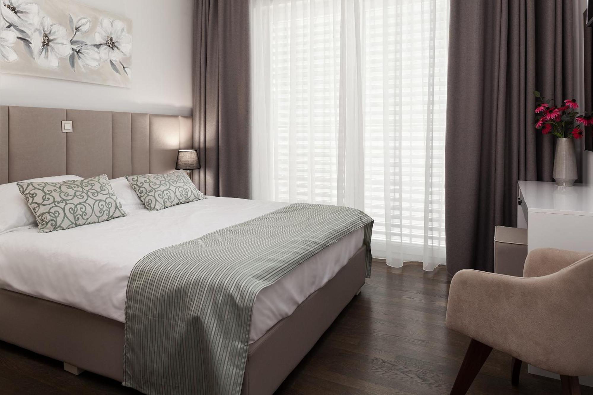 Deluxe Apartments Vila Carissa Малинска Номер фото